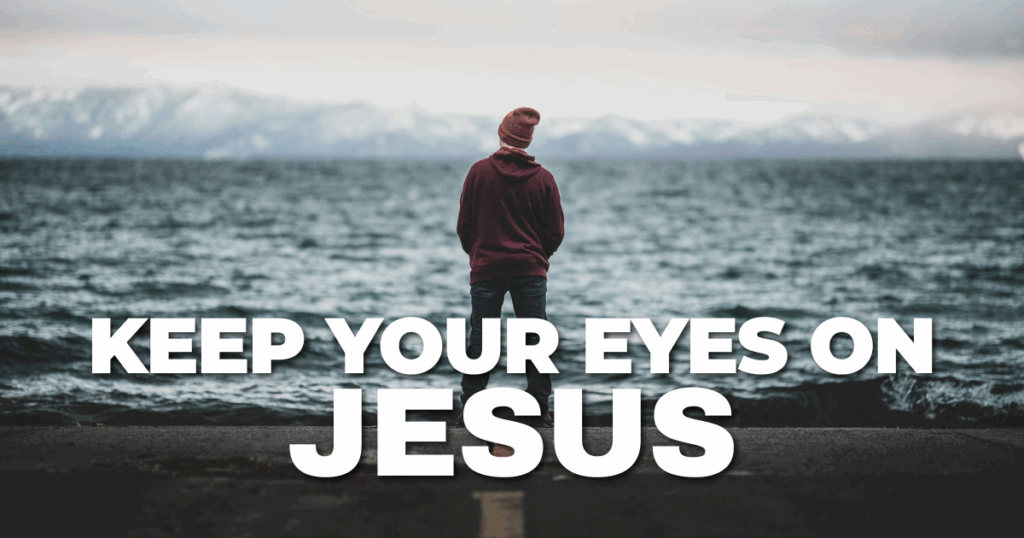 Man Looking Out to the Ocean & text saying "KEEP YOUR EYES ON JESUS"